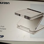 Aurzen ZIP Tri-Fold DLP Truly Mini Projector. Pocket Size. Zero-Lag Focus. One-Click Screen Mirroring. Full-Screen Mode. Type-C Fast Charging. 5.000mAh Battery. Indoor Outdoor Portable Projector.Gold