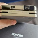 Aurzen ZIP Tri-Fold DLP Truly Mini Projector. Pocket Size. Zero-Lag Focus. One-Click Screen Mirroring. Full-Screen Mode. Type-C Fast Charging. 5.000mAh Battery. Indoor Outdoor Portable Projector.Gold