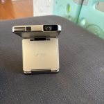 Aurzen ZIP Tri-Fold DLP Truly Mini Projector. Pocket Size. Zero-Lag Focus. One-Click Screen Mirroring. Full-Screen Mode. Type-C Fast Charging. 5.000mAh Battery. Indoor Outdoor Portable Projector.Gold